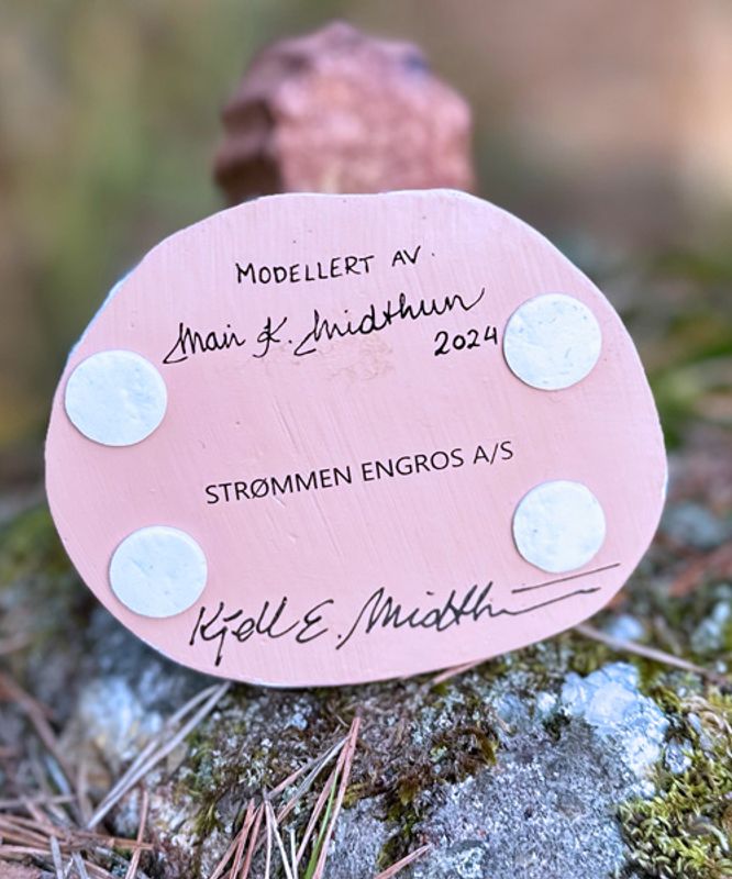 Midthun-nisse med stav